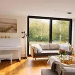 Daire Wellenklang - Luxusbungalow Mit Rosengarten